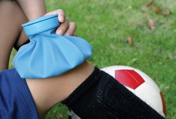 Apply a cold compress to a knee injury. 