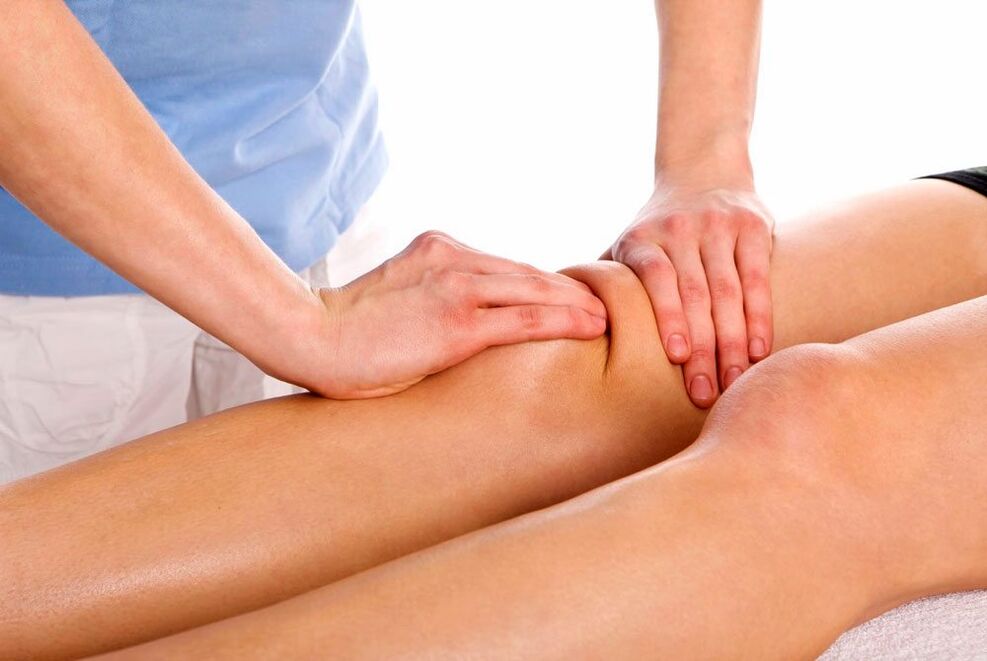 Therapeutic massage session for an injured knee