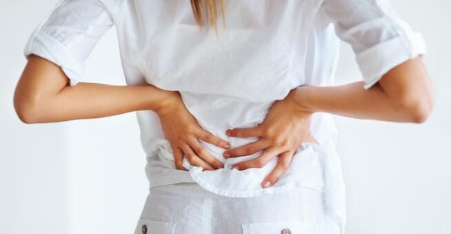 Back pain in the lumbar region. 